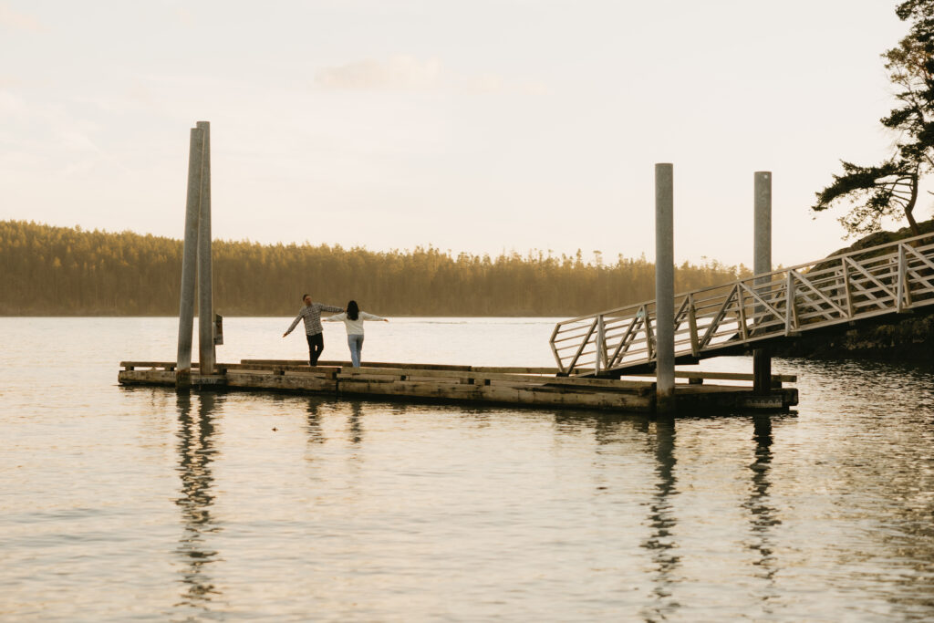 Couple dancing on a dock