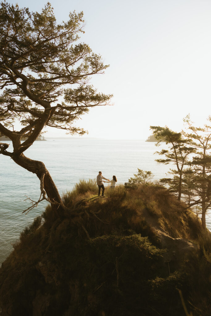 Couple dancing on an island at Deception Pass