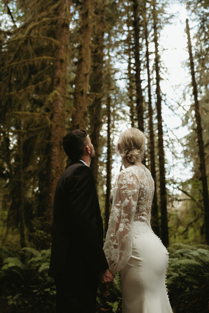 An Olympic National Park Elopement Photographer captures newlyweds in the Hoh Rainforest following their national park elopement in the PNW