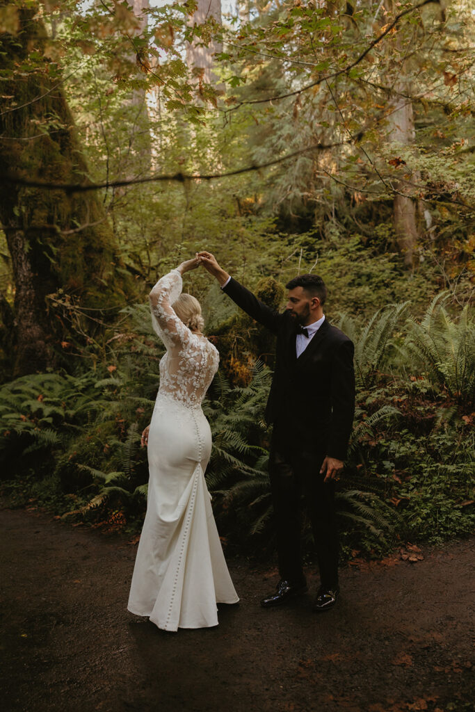 Newlyweds are photographed sharing a first dance following their Washington elopement ceremony